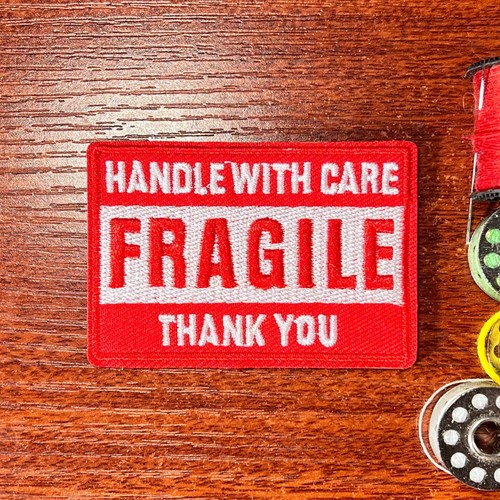 Fragile patch manico con - manico, cura